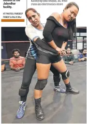  ?? HT PHOTOS: PARDEEP PANDIT & RAJ K RAJ ?? (Below) Trainees Rita Rani from Ludhiana and Divya Aale from Madhya Pradesh run practice moves at CWE. More women are stepping into the ring after Kavita Devi, a weightlift­er from Haryana, became the first Indian woman in the WWE, in 2017.