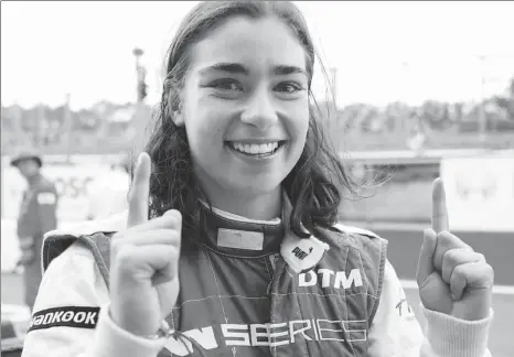  ?? REUTERS ?? Jamie Chadwick celebrates winning the W Series championsh­ip at Brands Hatch in England last August. The 21-year-old is hoping to become the first female F1 race driver since 1976.