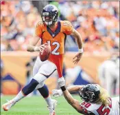  ?? GETTY IMAGES FILE ?? First-round pick Paxton Lynch (12) made his only career start in a 23-16 Week 5 loss to the Falcons. Lynch was 23 of 35 for 223 yards but couldn’t get the Broncos in the end zone until the game had been decided.