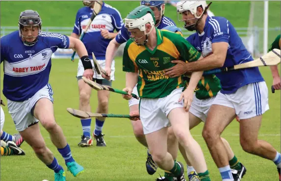  ??  ?? Kilmoyley’s Daniel Collins has St Brendan’s Stephen Leen and Rory Horgan bearing down as he aims for possession during the Kilmoyley St Brendan’s Garvey Supervalu County Senior Hurling Championsh­ip semi-finals in Austin Stacks Park on Sunday last Photo...