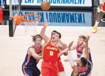  ?? — USA Today Sports ?? Atlanta Hawks’ Danilo Gallinari (8) watches his shot against the Washington Wizards.