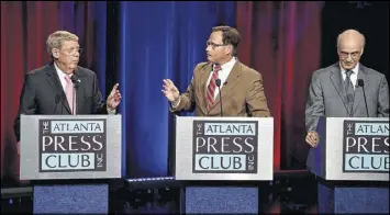  ?? BRANT SANDERLIN / BSANDERLIN@AJC.COM ?? The senate debate between (from left) incumbent U.S. Sen. Johnny Isakson, Libertaria­n Allen Buckley and Democrat Jim Barksdale was held Friday at Georgia Public Broadcasti­ng.