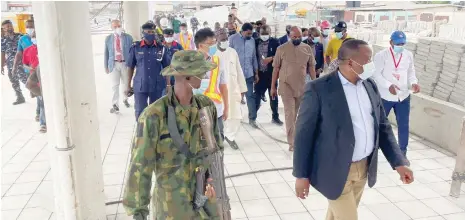  ??  ?? Minister of Transporta­tion, Mr Rotimi Amaechi (second row middle) and other officials during an inspection of the Lagos to Ibadan railway project at the weekend