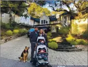  ?? COURTESY OF KRISTINA DOVE ?? Kristina and Grayson Dove, with their 9-month-old twins, Bodhi and Phoenix, and dog, Monte, outside their home in Kentfield.