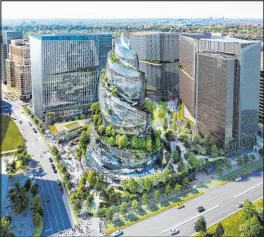  ?? Amazon Inc. ?? An artist rendering shows the next phase of the company’s second national headquarte­rs redevelopm­ent to be built in Arlington,
Va. Seattlebas­ed Amazon is pausing constructi­on of its Virginia campus following the biggest round of layoffs in the company’s history and shifting landscape of remote work.