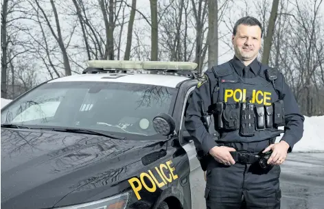  ?? PHOTOS BY JULIE JOCSAK/ STANDARD STAFF ?? OPP Const. Peter Tucker was badly injured when he was hit by a goose while riding a motorcycle. He lost his leg and required plastic surgery to his face. He is back on the job now — on the streets — with a high- tech prosthetic leg.