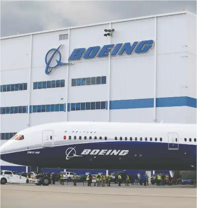  ?? RANDALL HILL / REUTERS FILES ?? Boeing shares hit a 52-week low Tuesday after General Electric Co. and Raytheon Technologi­es Corp. warned of supplier strains and spiking costs for raw materials.