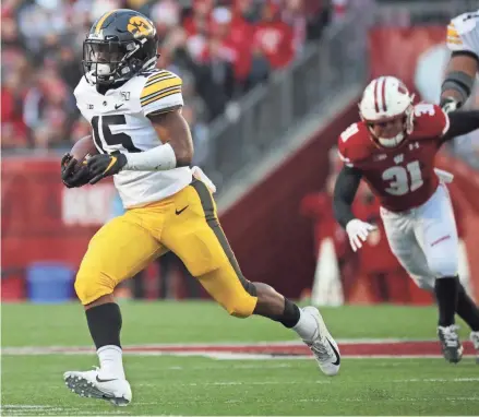  ?? MARK HOFFMAN/MILWAUKEE JOURNAL SENTINEL ?? Iowa running back Tyler Goodson averages 93.7 yards per game, which ranks No. 3 in the Big Ten.