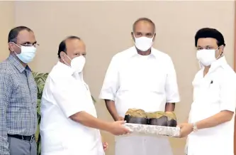  ??  ?? Chief Minister MK Stalin receives seeds of palm trees from Speaker M Appavu during the launch of Palmyra mission in Chennai on Friday