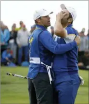  ?? MATT DUNHAM — THE ASSOCIATED PRESS FILE ?? In this file photo, Europe’s Jon Rahm celebrates after beating Tiger Woods in a singles match on the final day of the 42nd Ryder Cup at Le Golf National in Saint-Quentinen-Yvelines, outside Paris, France. Rahm says nothing else he has achieved in golf tops that moment.