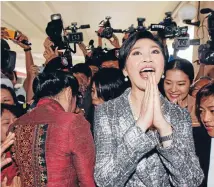  ?? Photo: REUTERS ?? On the outer: Yingluck Shinawatra’s rural supporters have criticised the scrapping of a controvers­ial rice subsidy scheme.