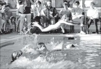  ?? 01_B27twe02 ?? Bombs away! A young girl leaps into the pool at the annual Arran Primary Schools swimming gala held at the Kinloch Hotel.