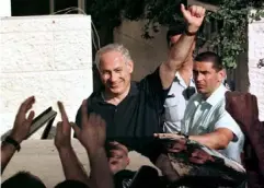  ??  ?? Netanyahu celebrates his 1996 win; he received 50.4 per cent of the vote to Shimon-Peres’s 49.5 per cent (Reuters)