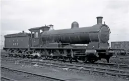  ?? T.G. HEPBURN/RAIL ARCHIVE STEPHENSON ?? NER ‘T1’ 0-8-0 No. 653 sporting its grenade and chevrons badges on the cabside, commemorat­ing its service with the ROD (see also pages 42-46).