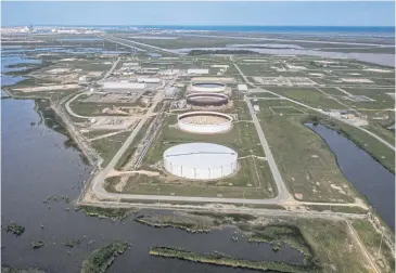  ?? REUTERS ?? The Bryan Mound Strategic Petroleum Reserve, an oil storage facility, is seen in this aerial photograph over Freeport, Texas.