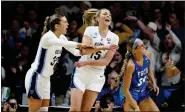  ?? MATT ROURKE — THE ASSOCIATED PRESS ?? Villanova’s Bella Runyan, left, and Brooke Mullin react during the first half against Florida Gulf Coast on Monday.