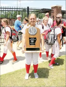  ?? MARK HUMPHREY ENTERPRISE-LEADER ?? Farmington 2018 graduate Camryn Journagan poses with the State Runner-Up trophy won by the Lady Cardinal softball team at the conclusion of the 5A State softball tournament. The Lady Cardinals went 3-1 at Harrison, beating Magnolia, 5-4; Paragould, 7-0; and De Queen, 8-3; before losing 3-2 to Greenbrier in the championsh­ip May 19 at Benton. Journagan has been named Female Athlete of the Year for school year 2017-2018 at Farmington by the Enterprise-Leader.