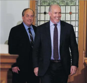  ?? CHAD HIPOLITO/THE CANADIAN PRESS ?? B.C. Green party Leader Andrew Weaver and NDP Leader John Horgan say the issue of finding a Speaker is not causing a rift and they are ready to move forward to form government.