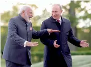  ?? — AP ?? Prime Minister Narendra Modi and Russian President Vladimir Putin during the St. Petersburg Internatio­nal Economic Forum on Thursday.