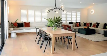  ?? ?? White shutters rather than blinds were added throughout the house, but the existing wooden dining table stayed.