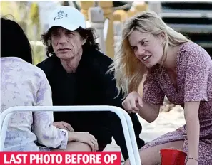  ??  ?? On the beach: Jagger in Miami with Georgia May on March 31 LAST PHOTO BEFORE OP