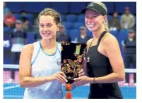  ??  ?? Happy duo: Andrea Sestini Hlavackova (right) and Barbora Strycova are the favourites in the WTA Finals in Singapore.