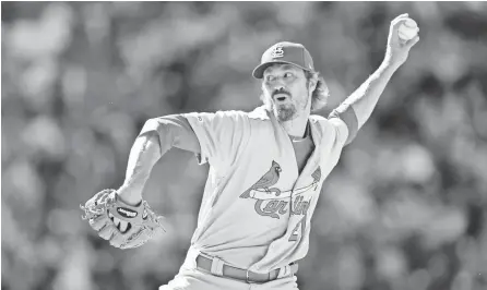  ?? DAVID ZALUBOWSKI/AP ?? “The vision for this season is far different than any of us ever imagined we would take part in,” Cardinals reliever Andrew Miller says.