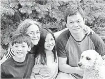  ?? COURTESY OF DEBORAH ROGERS ?? Deborah Rogers, with her husband Phu Tran and her children Eli, 10, and Isabel, 8, says side hustles give her more flexibilit­y to be with her kids. “I have more control over my time,” she says.