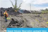  ??  ?? Hawaii Volcano Observator­y geologist documents the fissure 8 flow on Hawaii’s Big Island on June 1, 2018. —AFP
