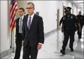  ?? CHIP SOMODEVILL­A / GETTY IMAGES ?? Federal Bureau of Investigat­ion Deputy Director Andrew McCabe (second from left) walks to a meeting with members of Congress on Thursday in Washington, D.C.