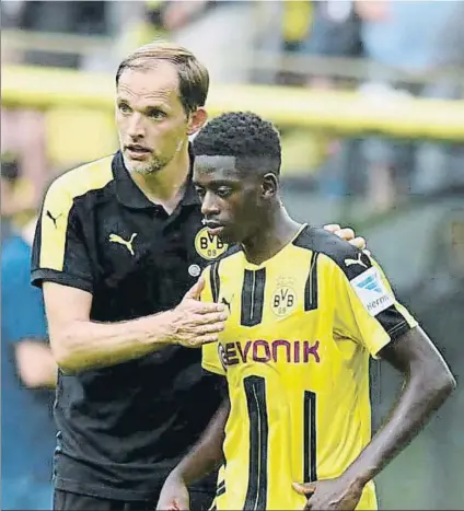  ??  ?? Tuchel y Dembélé, cuando ambos coincidier­on (en la temporada 2016-2017) en las filas del Borussia Dortmund