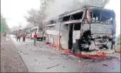  ?? PTI ?? Buses set ablaze by farmers in Dewas district of Madhya Pradesh on Wednesday, the seventh day of their agitation.