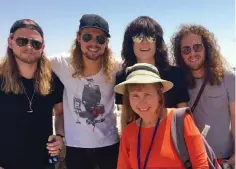  ??  ?? TOUR GUIDE Marilyn Fox shows Jerusalem’s Old City to members of Tyler Bryant and The Shakedown, the warm-up act for Guns ‘N’ Roses.