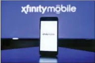  ?? JEFF FUSCO — AP IMAGES FOR COMCAST ?? Comcast introduces Xfinity Mobile on Thursday, April 6.