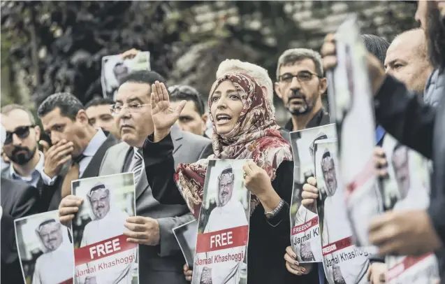  ??  ?? 0 Nobel Peace Prize laureate Yemeni Tawakkol Karman,right, flanked by Egyptian opposition politician Ayman Nour during a protest at the Saudi Arabian consulate in Istanbul