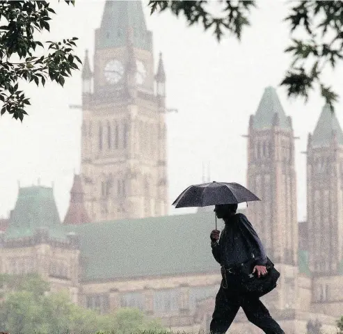  ?? JASON RANSOM / POSTMEDIA NEWS FILES ?? Canadians with median earnings could ask the Liberals how giving a tax cut to someone with incomes two times as high as theirs was supposed to make them less anxious about their situations, writes Stephen Gordon.