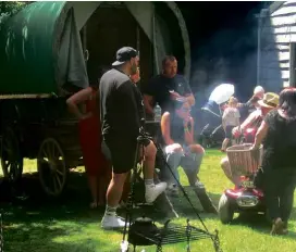  ??  ?? ABOVE: Scenes from the 2019 Surrey Romany Day: a family around the bow-top, and Bluey Bagley by the fire.