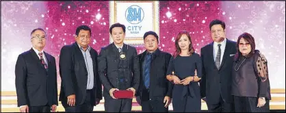  ??  ?? SM City Naga was recognized as the Shopping Center of the Year (medium category) during the Philippine Retailer’s Associatio­n’s 20th Outstandin­g Filipino Retailers and Shopping Centers of the Year Awards Night held recently at the Solaire Resort and...