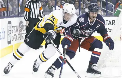  ?? Jay LaPrete/Associated Press ?? Brian Dumoulin is back at practice for the first time since his jaw surgery last month.