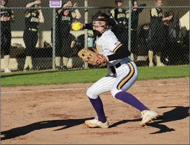  ?? Leanna Hanry/Special to News-Times ?? Extra infielder: Junction City pitcher Karla Castillo prepares to throw to first base after fielding a grounder in action this season against Rison.