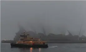  ??  ?? Any port in a storm: dense fogs envelop the harbour, talisman for the mood that was swallowing the place. Photograph: Mick Tsikas/AAP