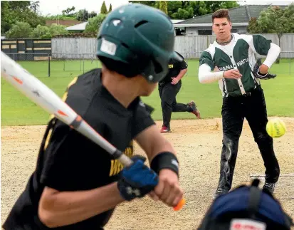  ?? PHOTO: WARWICK SMITH/FAIRFAX NZ ?? Manawatu under-17 pitcher Arana Millar unleashes during their game against Wellington at the Central region tournament at Colquhoun Park on Sunday, before rain stopped play.