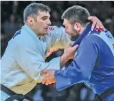  ??  ?? ijf.org Iran’s Javad Mahjoub (L) squares off against Inal Tasoev of Russia in the men’s +100kg final at the 2018 Antalya Grand Prix in Turkey on April 9, 2018.