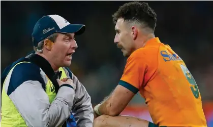  ?? Photograph: Peter Fitzpatric­k/Action Plus/Shuttersto­ck ?? Nic White of Australia receives medical attention after a head injury.