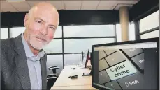  ??  ?? ONLINE CRIME: Cyber attacks cost UK business £23bn in 2015. Abover, Professor David Wall, who runs the Centre for Criminal Justice Studies in Leeds, inset.