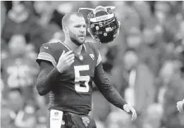  ?? TIM IRELAND/AP ?? Jacksonvil­le quarterbac­k Blake Bortles tosses his helmet after failing to complete a twopoint conversion attempt against Philadelph­ia. When things go sour, an NFL team’s fan base often attacks quarterbac­ks.