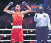  ??  ?? Rohit Chamoli after winning the 48kg final of the Asian Youth Boxing in Dubai on Sunday.