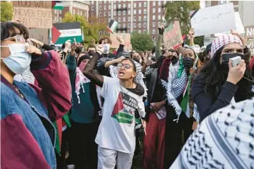  ?? YUKI IWAMURA/AP ?? Supporters of Palestinia­ns gather last month at Columbia University in New York for a protest of Israel’s retaliator­y attacks that have so far killed thousands of civilians.