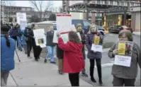  ?? JOSEPH PHELAN — JPHELAN@ DIGITALFIR­STMEDIA.COM ?? Several people stood in front of the NY GOP State convention reception Thursday, urging Claudia Tenney to apologize as well as asking for the convention to be held elsewhere.