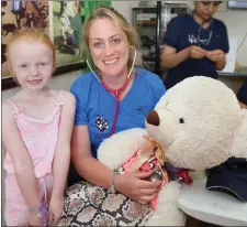  ??  ?? Bronagh Sheehan, Mallow, visited the Teddy Bear’s Hospital where veterinary student Elise O’Byrne White took care of her teddy.